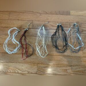 5 ribbon necklaces white, black, brown, cream, and gray